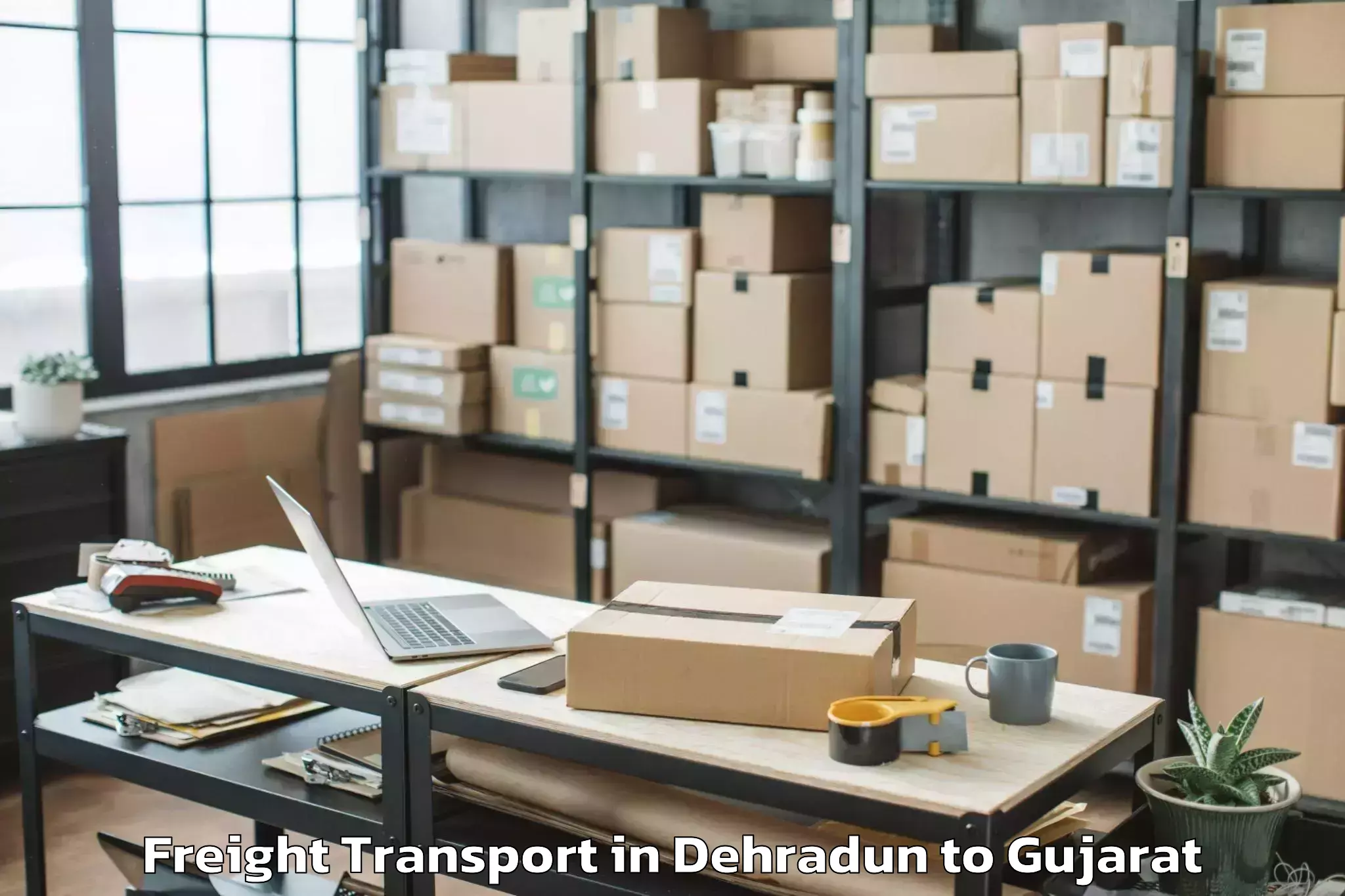 Book Your Dehradun to Keshod Airport Ixk Freight Transport Today